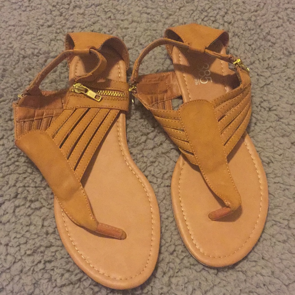 Tan sandals with zipper details